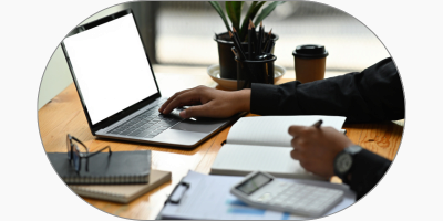 Person using laptop on desk