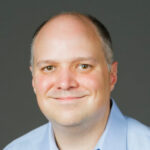 image of Rob Ditto wearing a light blue business shirt